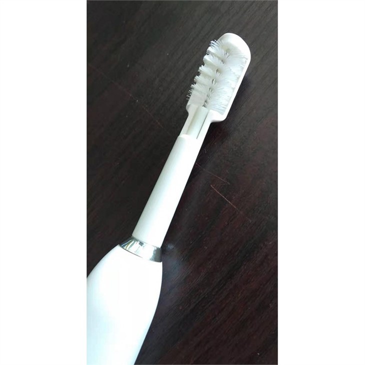 Cepillo de dientes giratorio